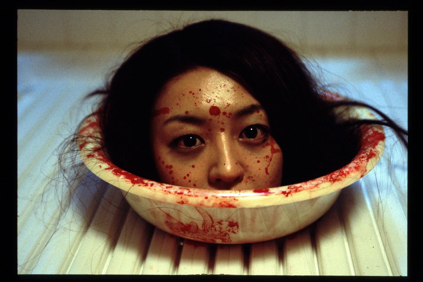 TOMIE RE BIRTH Image