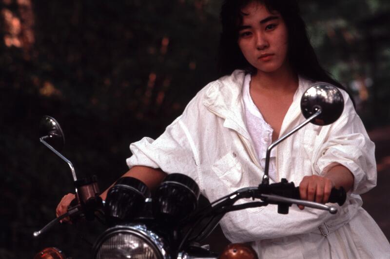 HIS MOTORBIKE, HER ISLAND Image