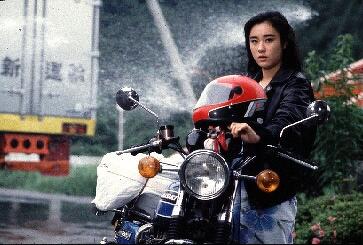 HIS MOTORBIKE, HER ISLAND Image