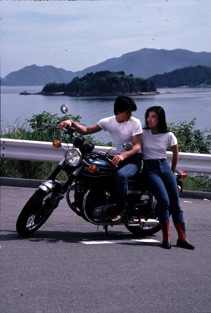 HIS MOTORBIKE, HER ISLAND Image