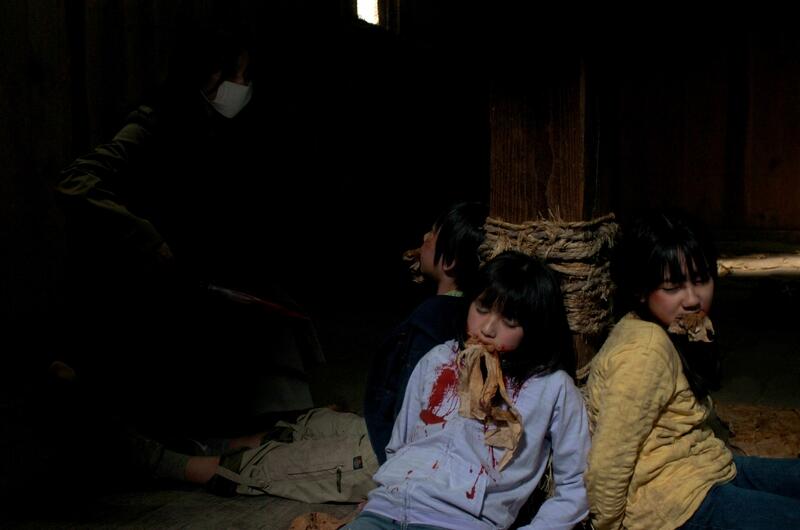 THE SLIT-MOUTHED WOMAN Image